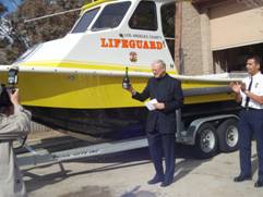 Mike Antonovich and Hugo Maldonado christen the new boat